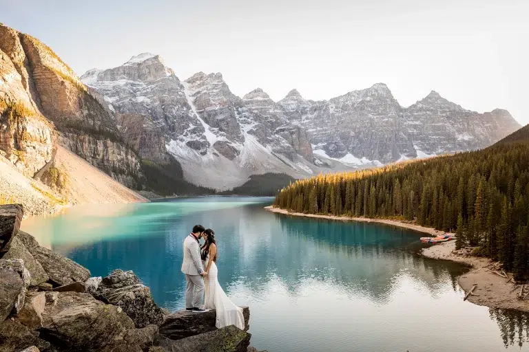 Couple elopes in front of Moraine Lake in Banff National Park
